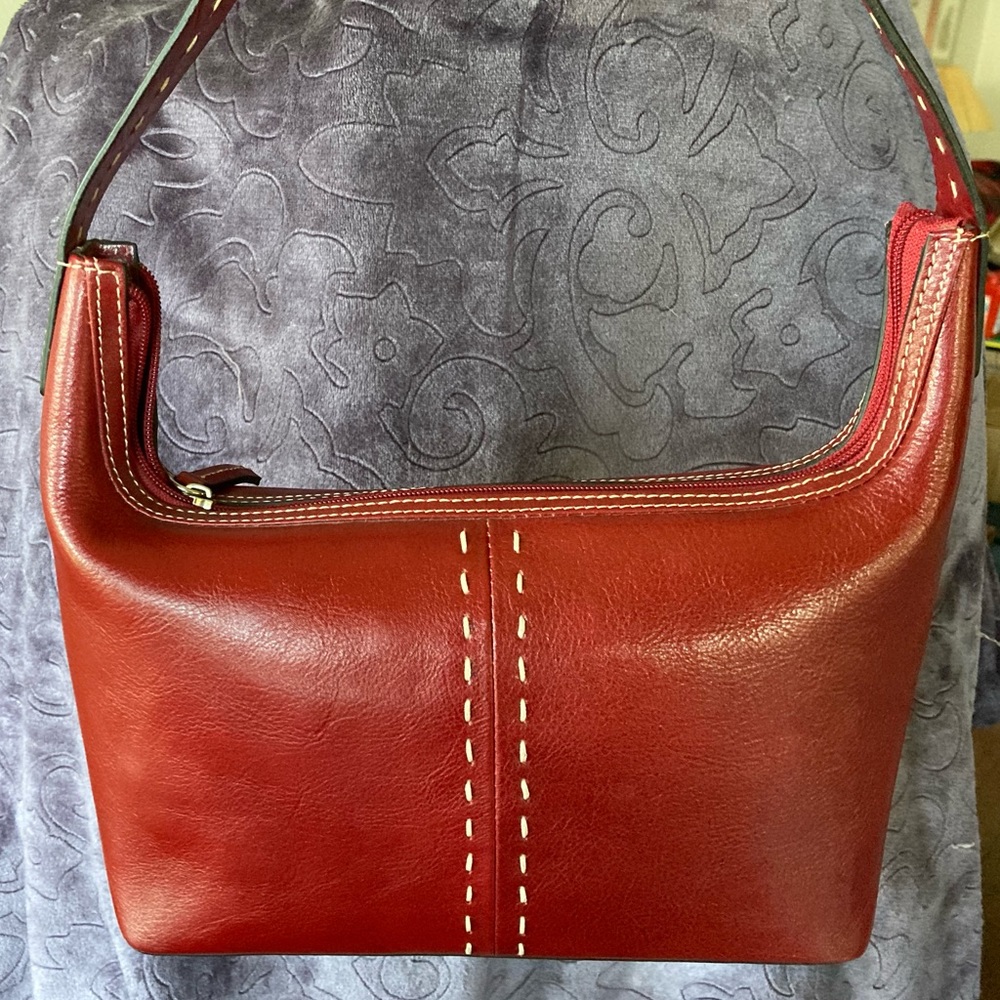 Red purse, white stitching, multiple pockets